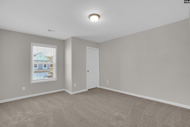 view of carpeted spare room