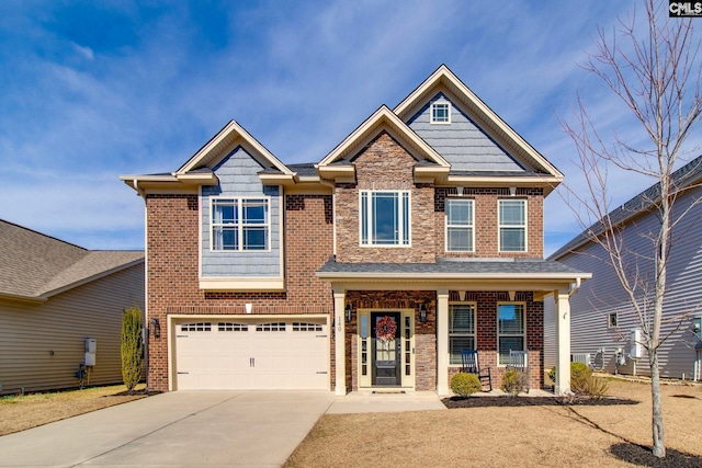 craftsman-style house with a garage and a porch