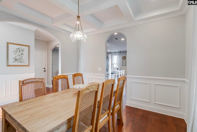 dining space with dark wood-type flooring, coffered ceiling, beam ceiling, and a notable chandelier