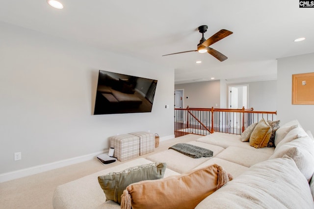 living room with carpet floors and ceiling fan