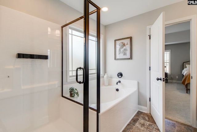 bathroom featuring plus walk in shower