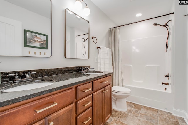 full bathroom with vanity, toilet, and shower / bath combo