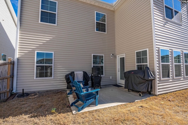 back of house with a patio area