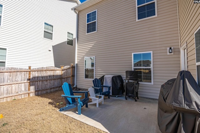 rear view of property featuring a patio