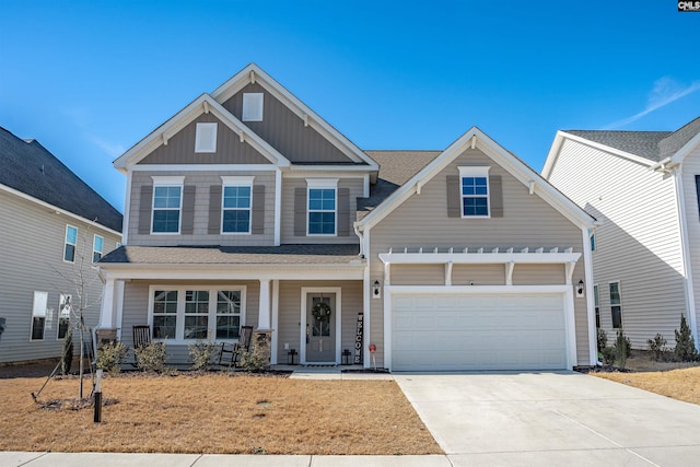 craftsman house featuring a garage and covered porch