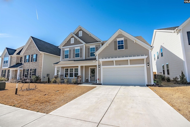 craftsman house featuring a garage and covered porch