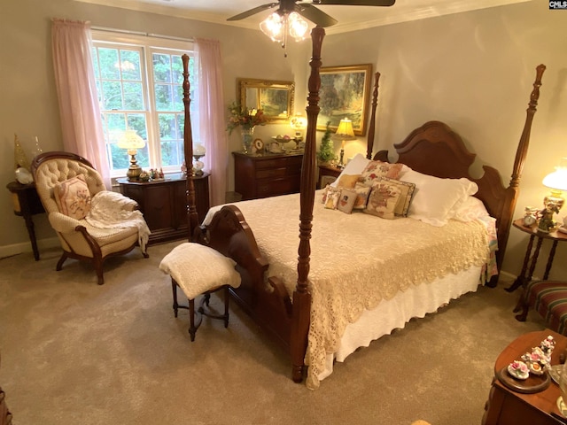 bedroom featuring crown molding, ceiling fan, and carpet flooring