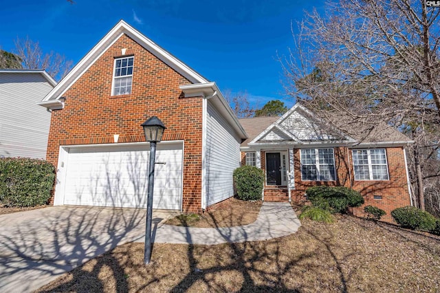 front of property with a garage