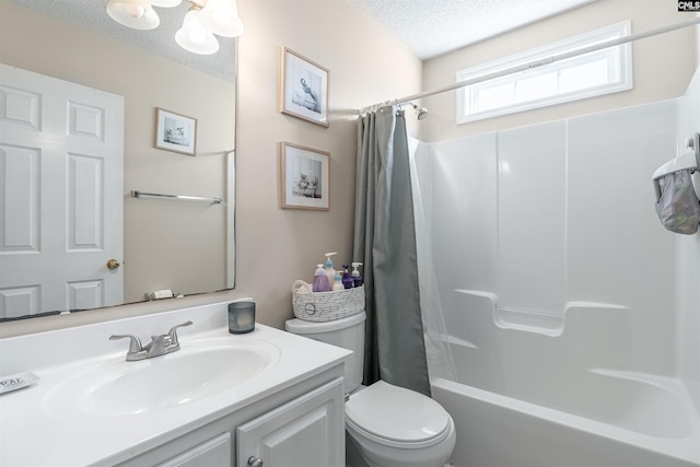 full bathroom with vanity, toilet, a textured ceiling, and shower / bathtub combination with curtain