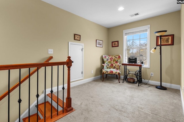 living area with carpet floors