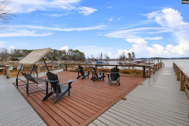 dock area with a water view