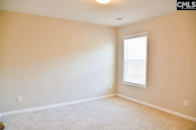 view of carpeted spare room