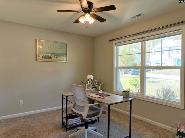 office space with ceiling fan and carpet flooring