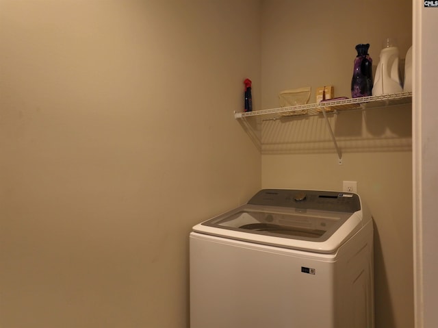 washroom featuring washer / dryer