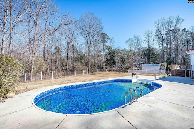 view of pool featuring a patio