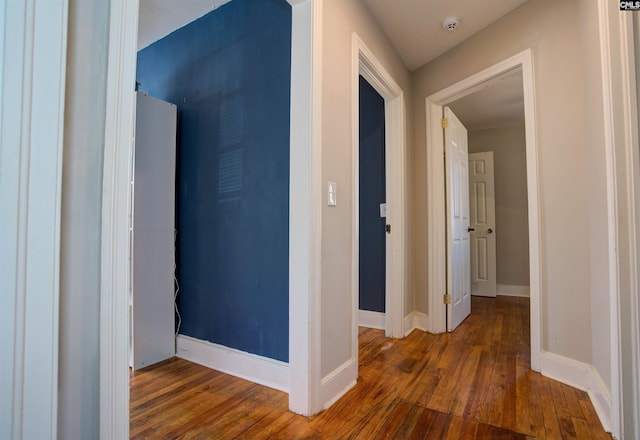 hallway featuring hardwood / wood-style floors