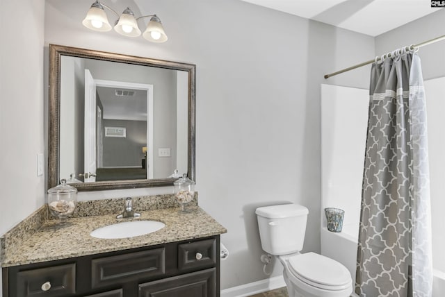 full bathroom featuring vanity, toilet, and shower / bath combo with shower curtain