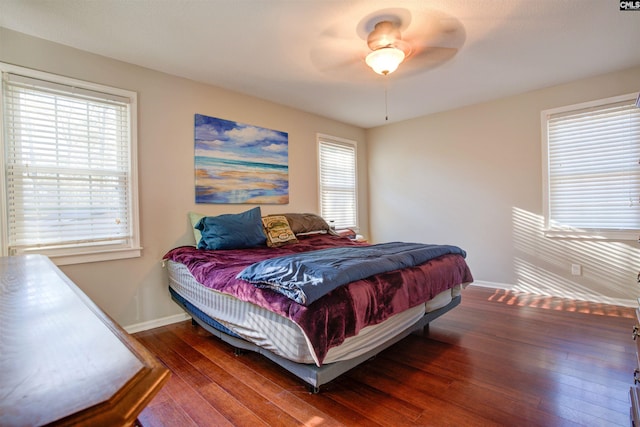 bedroom featuring hardwood / wood-style flooring and ceiling fan