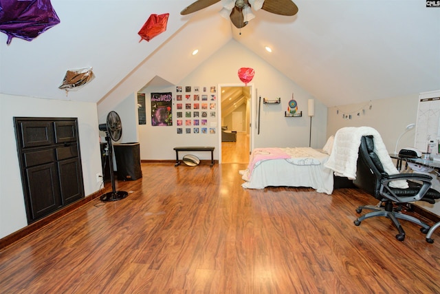 bedroom with wood-type flooring, lofted ceiling, and ceiling fan