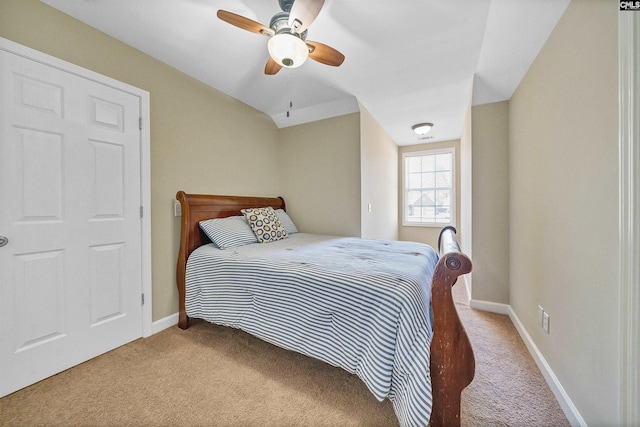 bedroom with ceiling fan and light colored carpet