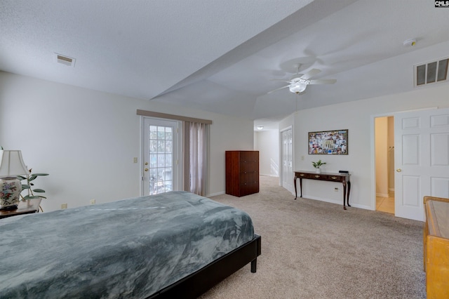 bedroom with vaulted ceiling, access to outside, ceiling fan, light carpet, and a textured ceiling