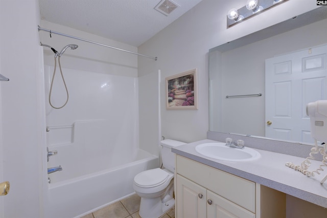 full bathroom with tile patterned floors, toilet, bathing tub / shower combination, a textured ceiling, and vanity