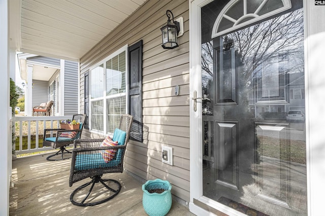 deck featuring covered porch