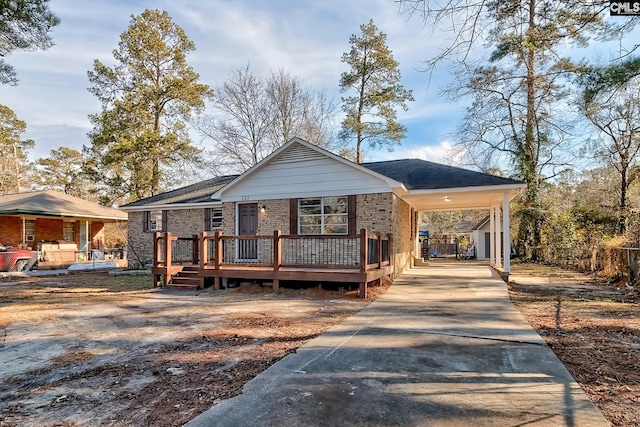 view of front of house featuring a carport