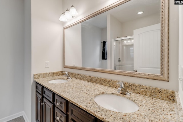 bathroom featuring vanity and walk in shower