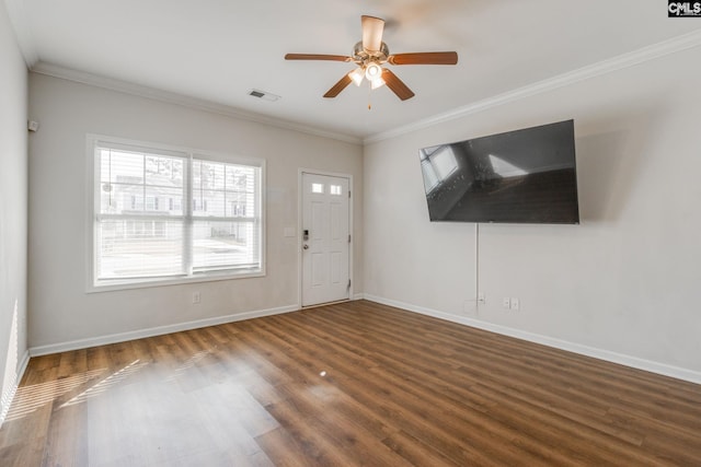 foyer entrance featuring ornamental molding, ceiling fan, and dark hardwood / wood-style flooring