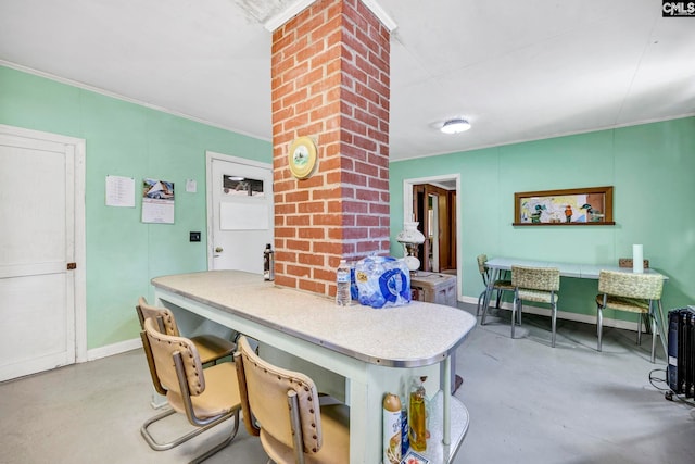 kitchen featuring crown molding