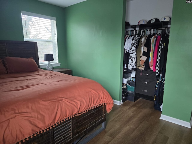 bedroom featuring dark hardwood / wood-style floors