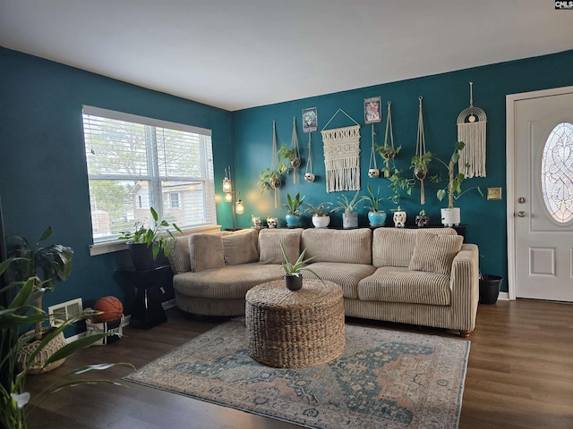 living room with dark hardwood / wood-style floors