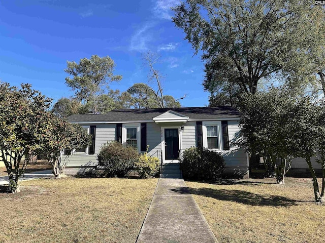 view of front of property with a front lawn