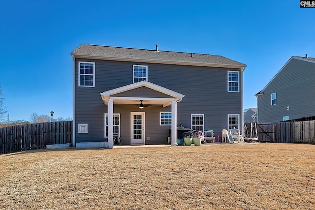 back of house with a patio, a yard, and ceiling fan