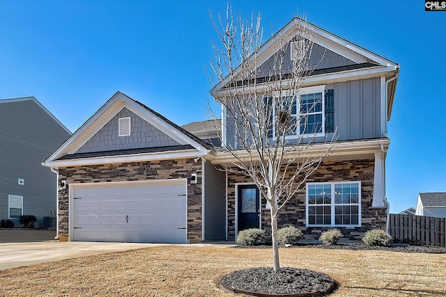 craftsman-style house featuring a garage and cooling unit