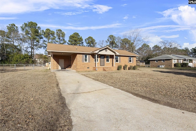 ranch-style house with a carport