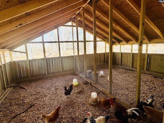 interior space with vaulted ceiling and a healthy amount of sunlight