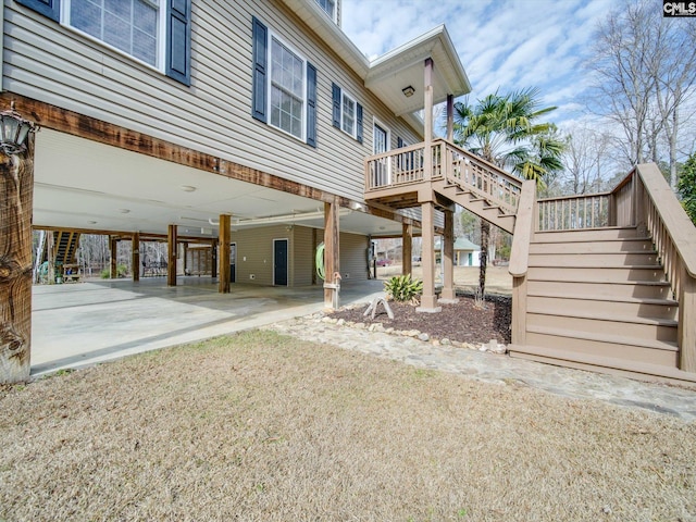 back of property featuring a carport