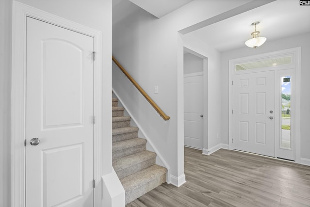 foyer with light hardwood / wood-style floors