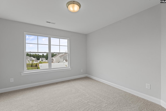 spare room with carpet flooring