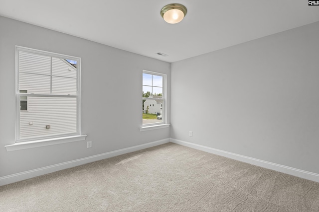 spare room with carpet flooring