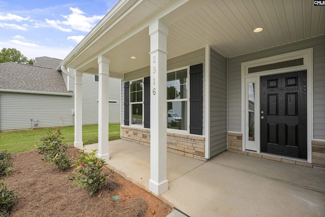 doorway to property featuring a porch