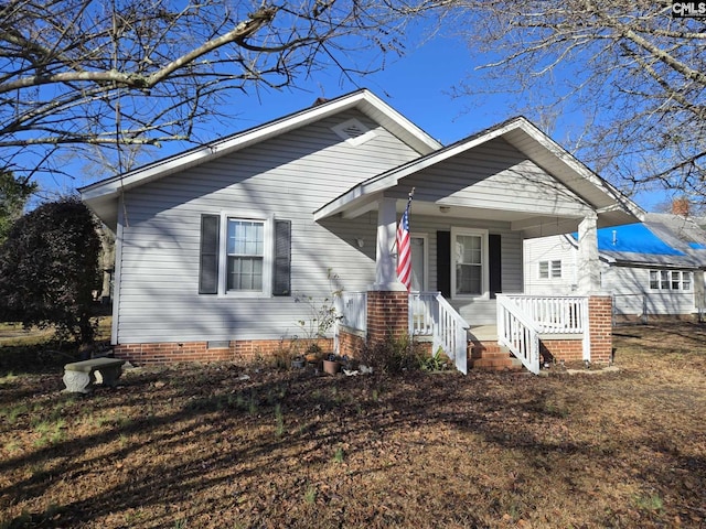 view of front of property featuring covered porch