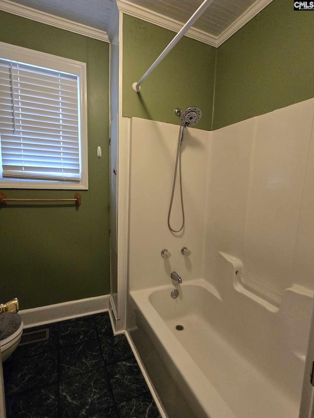 bathroom featuring crown molding and shower / bathtub combination