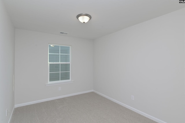 empty room featuring carpet flooring