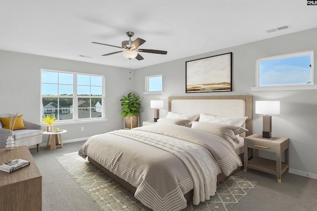 carpeted bedroom featuring ceiling fan