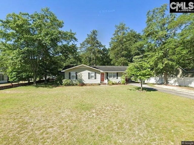 view of front of home with a front yard