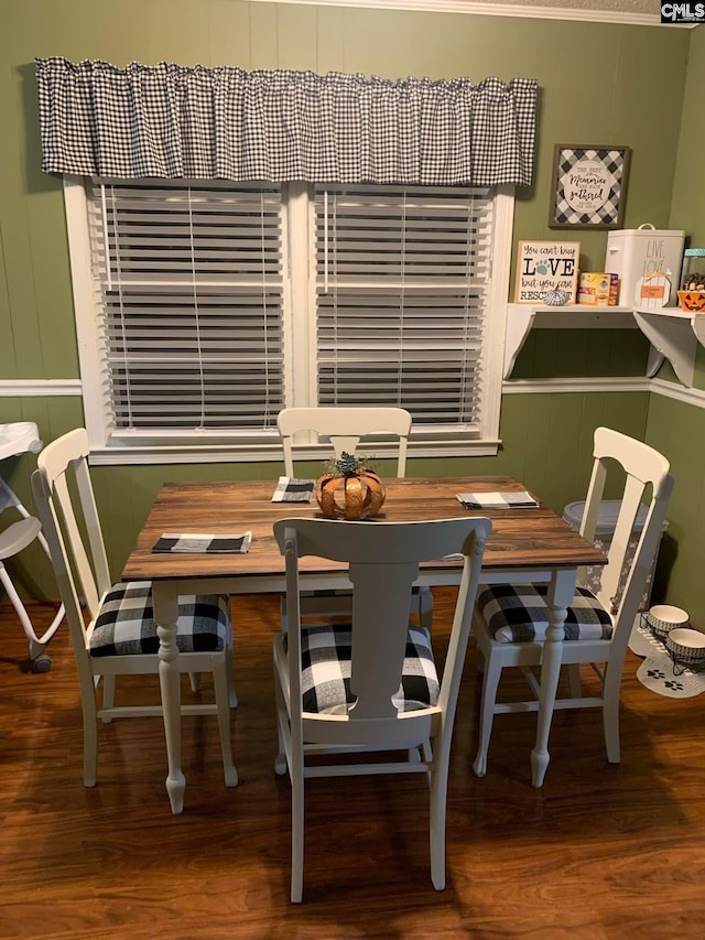 dining room with hardwood / wood-style flooring