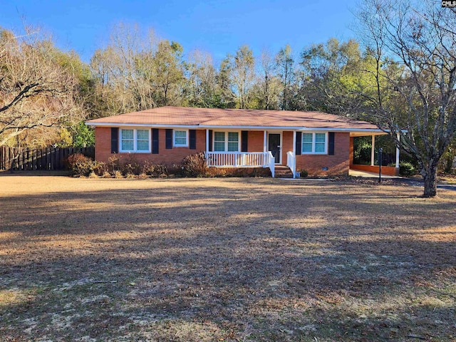 ranch-style home featuring covered porch